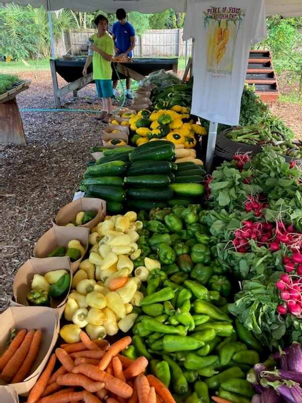 Vegetables from the Peace of Heart garden at market.